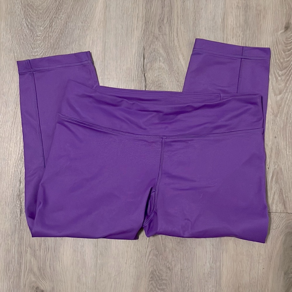 Under Armour purple compression capris women’s sz med